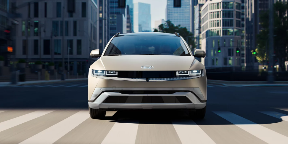 Hyundai IONIQ 5 driving in the city.